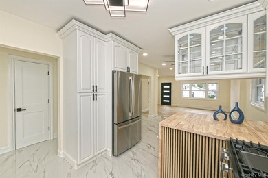 Completely updated and ready to move right into, this Bellmore - photo 3