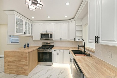 Completely updated and ready to move right into, this Bellmore - photo 4