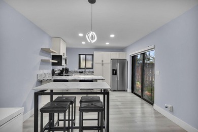 Welcome to this beautifully remodeled 2 bedroom, 1.5 bathroom - photo 3
