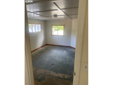 Coastal Cottage Fixer-Upper on Nearly an Acre in Port - photo 8