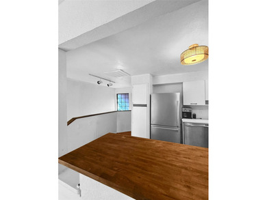 A rare corner unit with no shared walls, offering privacy and - photo 11