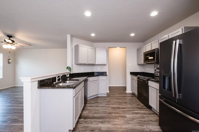 Welcome home to 1505 Yarrow Drive! From the moment you walk - photo 14