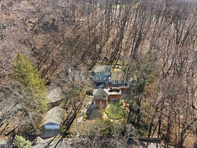 Lake Mohawk custom lake-style home set on .87 private acres with - photo 2