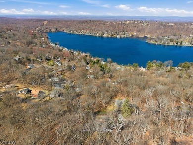 Lake Mohawk custom lake-style home set on .87 private acres with - photo 3