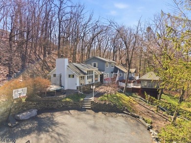 Lake Mohawk custom lake-style home set on .87 private acres with - photo 6