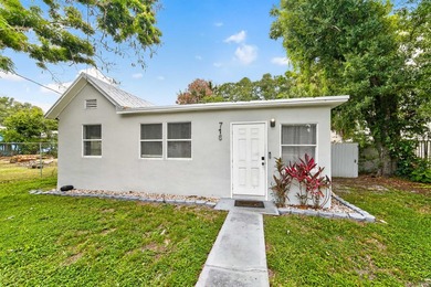 Located in Fort Pierce's Historic District, this charming home - photo 2