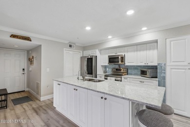 What a Belleza Beauty! This exceptional first-floor, waterfront - photo 12