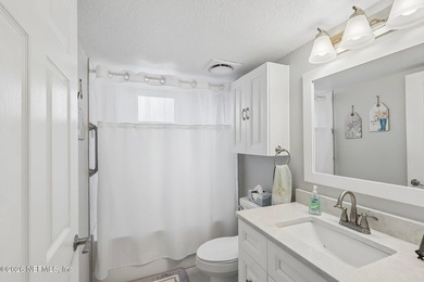 What a Belleza Beauty! This exceptional first-floor, waterfront - photo 22