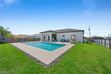 Beautiful 2023-built home in Cape Coral featuring impact windows - photo 29