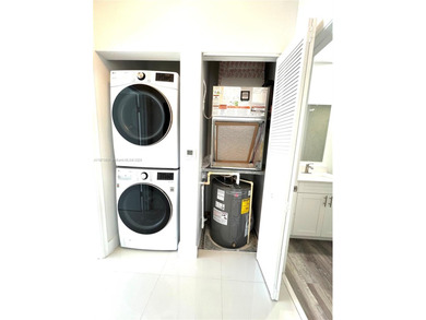 Stunning all-white, tastefully remodeled Penthouse featuring