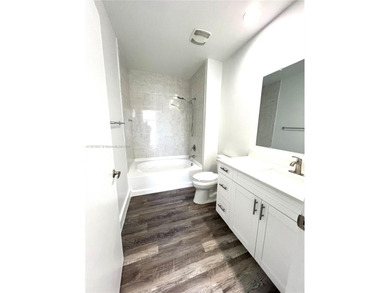 Stunning all-white, tastefully remodeled Penthouse featuring