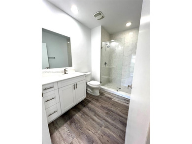 Stunning all-white, tastefully remodeled Penthouse featuring