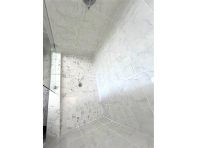 Stunning all-white, tastefully remodeled Penthouse featuring