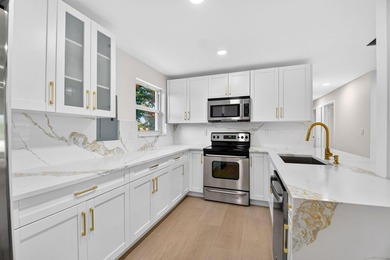 Welcome to this beautifully renovated home in Seminole Manor - photo 14