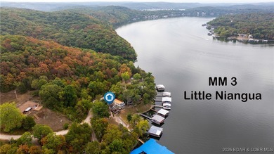Located in Jackson Hollow Cove on the 3 mile marker of the