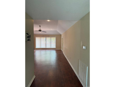 This wonderful 3 bedroom & 2 full bath home awaits is back on