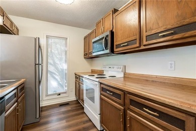 Affordable, end unit townhome! 3 bedrooms, plus a flex room.  2