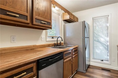 Affordable, end unit townhome! 3 bedrooms, plus a flex room.  2