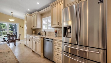 Welcome to Boca Woods Country Club. Exceptional updated home - photo 11