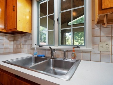 Discover your new home at 1078 Five Mile Line Rd., nestled on a - photo 12
