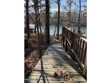 Well maintained home on the lake with pier and boat slip. Home - photo 12