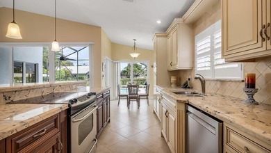 Welcome to Boca Woods Country Club. Exceptional updated home - photo 12