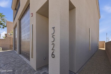 NEW CONSTRUCTION DOUBLE RV GARAGE HOME IN GATED COMMUNITY - photo 3