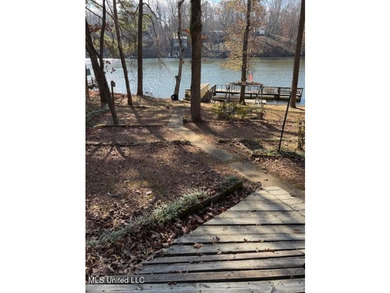 Well maintained home on the lake with pier and boat slip. Home - photo 13