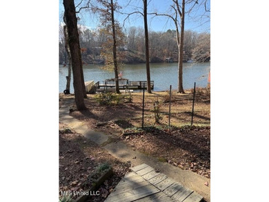 Well maintained home on the lake with pier and boat slip. Home - photo 14