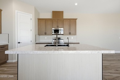 NEW CONSTRUCTION DOUBLE RV GARAGE HOME IN GATED COMMUNITY - photo 5