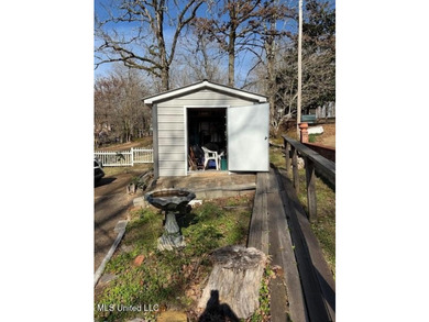 Well maintained home on the lake with pier and boat slip. Home - photo 16