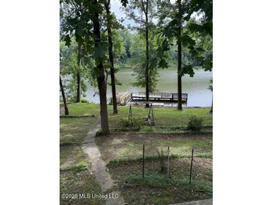 Well maintained home on the lake with pier and boat slip. Home - photo 30
