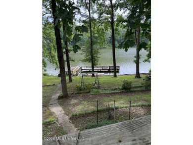 Well maintained home on the lake with pier and boat slip. Home - photo 33