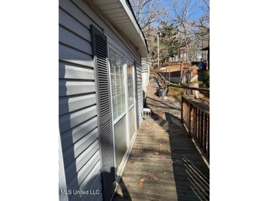 Well maintained home on the lake with pier and boat slip. Home - photo 48