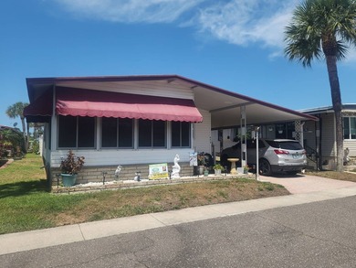 Welcome to this charming manufactured double-wide in the very - photo 2