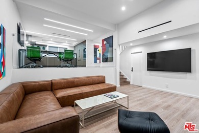 This extensively renovated front-facing multi-story townhome - photo 3