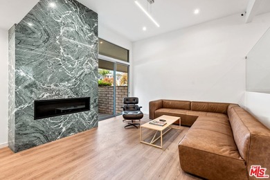 This extensively renovated front-facing multi-story townhome - photo 4