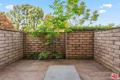 This extensively renovated front-facing multi-story townhome - photo 5