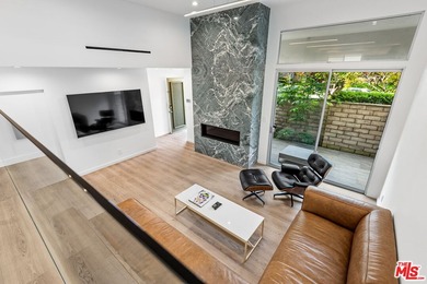 This extensively renovated front-facing multi-story townhome - photo 9