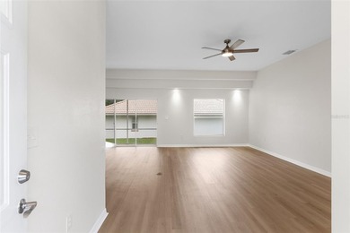 This remodeled 3/2 single-family residence offers comfort - photo 5