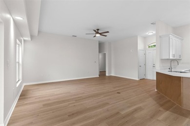 This remodeled 3/2 single-family residence offers comfort - photo 9