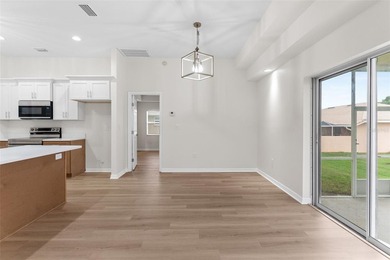 This remodeled 3/2 single-family residence offers comfort - photo 10
