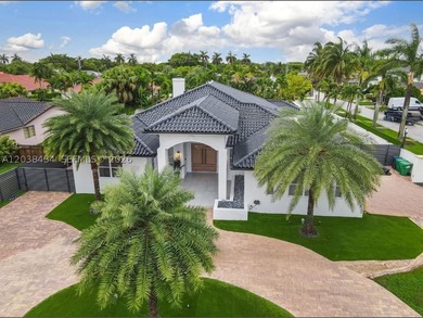 This stunning, fully gated one-story estate is ideally located - photo 1
