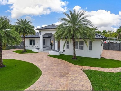 This stunning, fully gated one-story estate is ideally located - photo 2