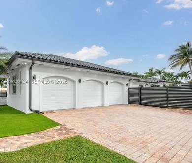 This stunning, fully gated one-story estate is ideally located - photo 3