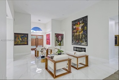 This stunning, fully gated one-story estate is ideally located - photo 9