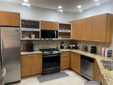 Welcome to Artesia, a premier gated community in Sunrise. This - photo 3