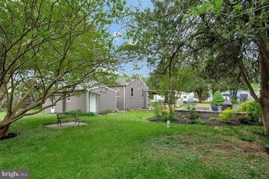 Tucked into the water-privileged community of Woodland Beach in - photo 31