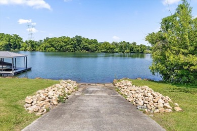 Experience exceptional waterfront living in this custom-built - photo 3