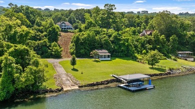 Experience exceptional waterfront living in this custom-built - photo 4